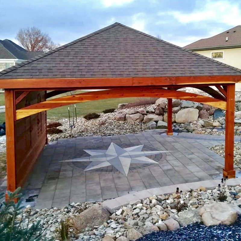 The Loreto Pavilion (Options: 20' L x 20' W, No Privacy Panels, California Redwood, 10' H, Electrical Wiring Trim for 1 Post, 4-Post Anchor Kit for Gale-Wind, No Post Decorative Trim, 1 Ceiling Fan Base, No Curtain Rods, Transparent Premium Sealant, Custom Wall with Shutters). Photo Courtesy of A. Schurman of Cedar Falls, Iowa. The Loreto Pavilion (Options: 20' L x 20' W, No Privacy Panels, California Redwood, 10' H, Electrical Wiring Trim for 1 Post, 4-Post Anchor Kit for Gale-Wind, No Post Decorative Trim, 1 Ceiling Fan Base, No Curtain Rods, Transparent Premium Sealant, Custom Wall with Shutters). Photo Courtesy of A. Schurman of Cedar Falls, Iowa.