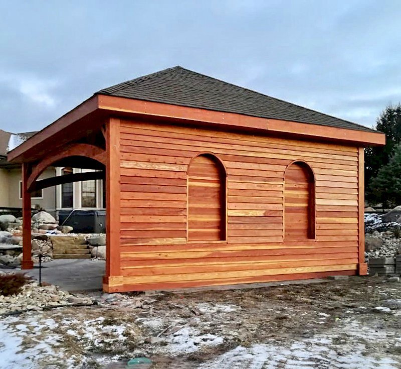 The Loreto Pavilion (Options: 20' L x 20' W, No Privacy Panels, California Redwood, 10' H, Electrical Wiring Trim for 1 Post, 4-Post Anchor Kit for Gale-Wind, No Post Decorative Trim, 1 Ceiling Fan Base, No Curtain Rods, Transparent Premium Sealant, Custom Wall with Shutters). Photo Courtesy of A. Schurman of Cedar Falls, Iowa. The Loreto Pavilion (Options: 20' L x 20' W, No Privacy Panels, California Redwood, 10' H, Electrical Wiring Trim for 1 Post, 4-Post Anchor Kit for Gale-Wind, No Post Decorative Trim, 1 Ceiling Fan Base, No Curtain Rods, Transparent Premium Sealant, Custom Wall with Shutters). Photo Courtesy of A. Schurman of Cedar Falls, Iowa.