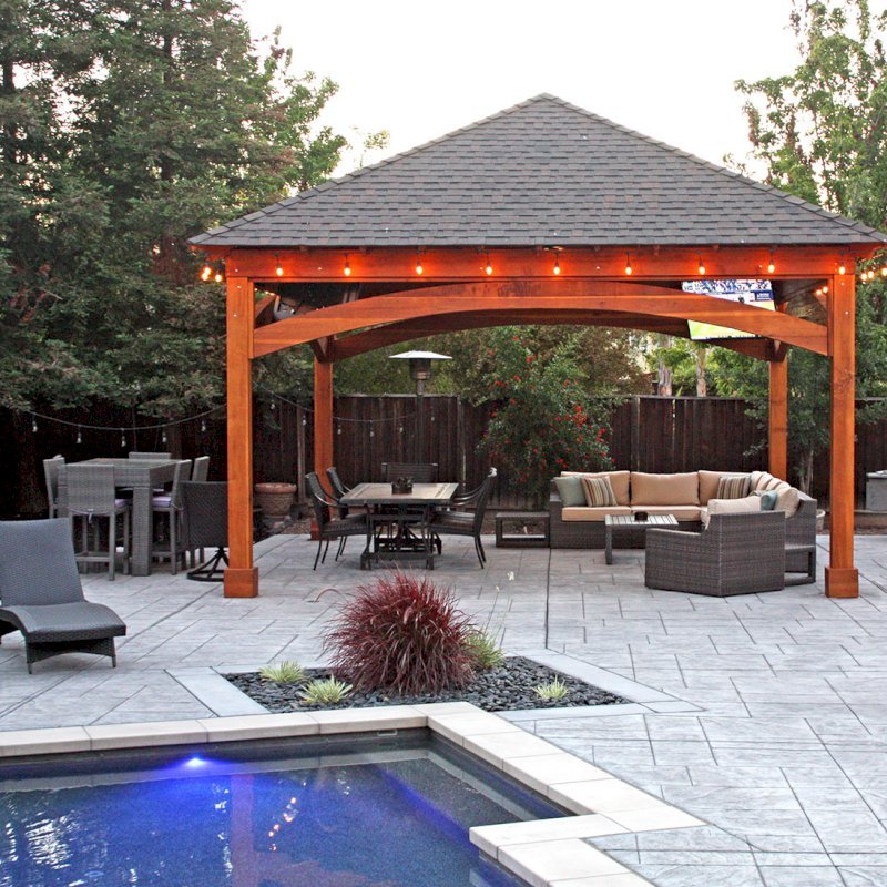 The Loreto Pavilion (Options: 20ft L x 20ft W, No Privacy Panels, California Redwood, 10ft H, Electrical Wiring for 2 Posts, 4-Post Anchor Kit for Gale Wind, No Post Decorative Trim, 1 Ceiling Fan Base, No Curtain Rods, Transparent Premium Sealant). Photo Courtesy of G. Arruda of Livermore, California. The Loreto Pavilion (Options: 20ft L x 20ft W, No Privacy Panels, California Redwood, 10ft H, Electrical Wiring for 2 Posts, 4-Post Anchor Kit for Gale Wind, No Post Decorative Trim, 1 Ceiling Fan Base, No Curtain Rods, Transparent Premium Sealant). Photo Courtesy of G. Arruda of Livermore, California.