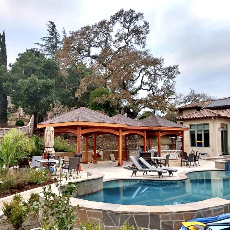 The Loreto Pavilions (Options: 14' x 14' & 12' x 12' Sizes, California Redwood, Transparent Premium Sealant). Photo Courtesy of Jeanie Chong of Los Altos, California. The Loreto Pavilions (Options: 14' x 14' & 12' x 12' Sizes, California Redwood, Transparent Premium Sealant). Photo Courtesy of Jeanie Chong of Los Altos, California.