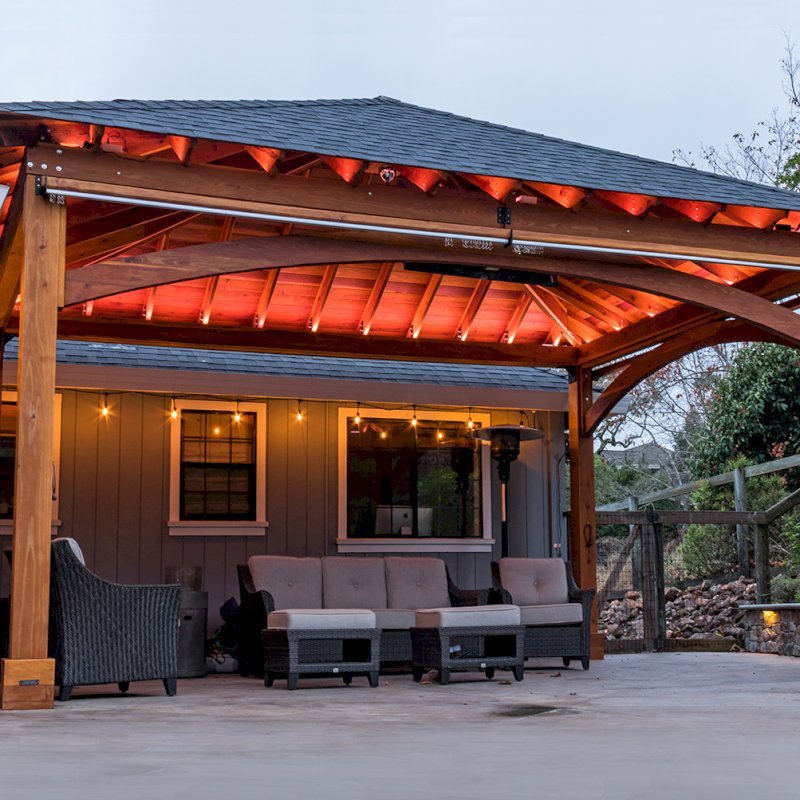 The Loreto Pavilion (Options: 24' L x 18' W, No Privacy Panels, California Redwood, 10' H, Electrical Wiring for 1 Post, 4-Post Anchor Kit for Concrete, No Post Decorative Trim, 1 Ceiling Fan Base, 2 Curtain Rods, Transparent Premium Sealant). Photo Courtesy of J. McLauglin of Santa Rosa, California. The Loreto Pavilion (Options: 24' L x 18' W, No Privacy Panels, California Redwood, 10' H, Electrical Wiring for 1 Post, 4-Post Anchor Kit for Concrete, No Post Decorative Trim, 1 Ceiling Fan Base, 2 Curtain Rods, Transparent Premium Sealant). Photo Courtesy of J. McLauglin of Santa Rosa, California.