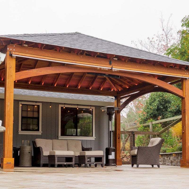 The Loreto Pavilion (Options: 24' L x 18' W, No Privacy Panels, California Redwood, 10' H, Electrical Wiring for 1 Post, 4-Post Anchor Kit for Concrete, No Post Decorative Trim, 1 Ceiling Fan Base, 2 Curtain Rods, Transparent Premium Sealant). Photo Courtesy of J. McLauglin of Santa Rosa, California. The Loreto Pavilion (Options: 24' L x 18' W, No Privacy Panels, California Redwood, 10' H, Electrical Wiring for 1 Post, 4-Post Anchor Kit for Concrete, No Post Decorative Trim, 1 Ceiling Fan Base, 2 Curtain Rods, Transparent Premium Sealant). Photo Courtesy of J. McLauglin of Santa Rosa, California.