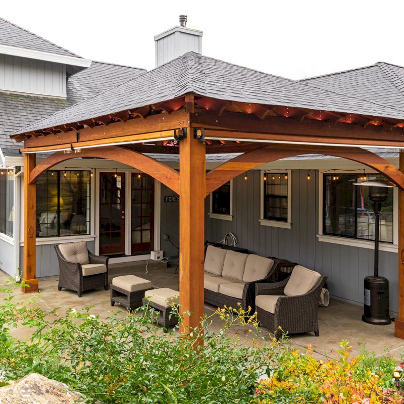 The Loreto Pavilion (Options: 24' L x 18' W, No Privacy Panels, California Redwood, 10' H, Electrical Wiring for 1 Post, 4-Post Anchor Kit for Concrete, No Post Decorative Trim, 1 Ceiling Fan Base, 2 Curtain Rods, Transparent Premium Sealant). Photo Courtesy of J. McLauglin of Santa Rosa, California. The Loreto Pavilion (Options: 24' L x 18' W, No Privacy Panels, California Redwood, 10' H, Electrical Wiring for 1 Post, 4-Post Anchor Kit for Concrete, No Post Decorative Trim, 1 Ceiling Fan Base, 2 Curtain Rods, Transparent Premium Sealant). Photo Courtesy of J. McLauglin of Santa Rosa, California.