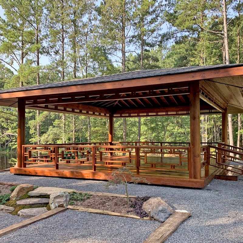 Custom The Loreto Pavilion (Options: 32' x 32', Mature Redwood, Post Anchor Kit for Gale-Wind, No Electrical Wiring Trim Kit, 4ft Overhangs by Custom Request, Custom Deck and Railings, Transparent Premium Sealant). Photo J. Hill of Apex, North Carolina. Custom The Loreto Pavilion (Options: 32' x 32', Mature Redwood, Post Anchor Kit for Gale-Wind, No Electrical Wiring Trim Kit, 4ft Overhangs by Custom Request, Custom Deck and Railings, Transparent Premium Sealant). Photo J. Hill of Apex, North Carolina.