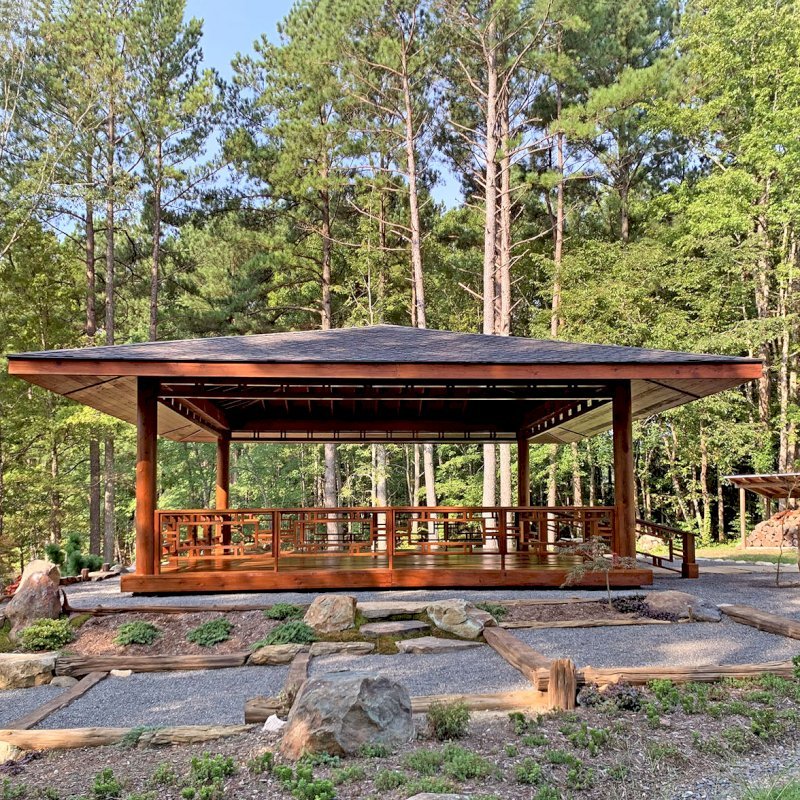 Custom The Loreto Pavilion (Options: 32' x 32', Mature Redwood, Post Anchor Kit for Gale-Wind, No Electrical Wiring Trim Kit, 4ft Overhangs by Custom Request, Custom Deck and Railings, Transparent Premium Sealant). Photo J. Hill of Apex, North Carolina. Custom The Loreto Pavilion (Options: 32' x 32', Mature Redwood, Post Anchor Kit for Gale-Wind, No Electrical Wiring Trim Kit, 4ft Overhangs by Custom Request, Custom Deck and Railings, Transparent Premium Sealant). Photo J. Hill of Apex, North Carolina.