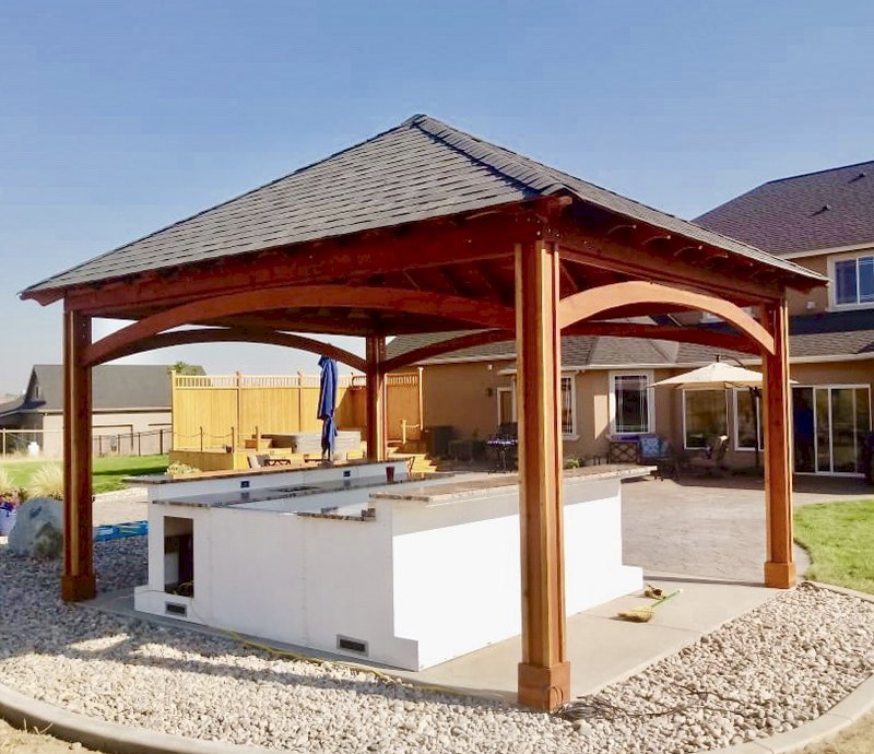 The Loreto Pavilion (Options: 18' L x 14' W, No Privacy Panels, California Redwood, 9' H, 2 Electrical Wiring Trims, 4-Post Anchor Kit for Concrete, Vertical Post Decorative Trims, 1 Ceiling Fan Base, No Curtain Rods, Transparent Premium Sealant). Photo Courtesy of S. Whitley of Moses Lake, Washington. The Loreto Pavilion (Options: 18' L x 14' W, No Privacy Panels, California Redwood, 9' H, 2 Electrical Wiring Trims, 4-Post Anchor Kit for Concrete, Vertical Post Decorative Trims, 1 Ceiling Fan Base, No Curtain Rods, Transparent Premium Sealant). Photo Courtesy of S. Whitley of Moses Lake, Washington.