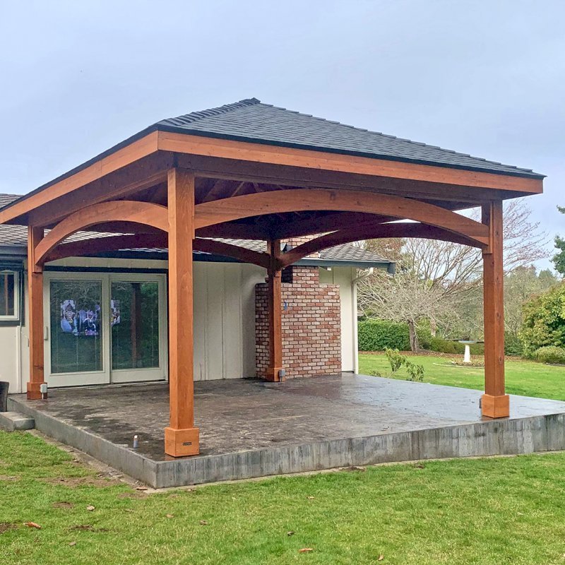 The Loreto Pavilion (Options: 20' L x 18' W, No Privacy Panels, Mature Redwood, 10' H Posts, 2 Electrical Wiring Trims, 4-Post Anchor Kit for High Wind, No Post Decorative Trims, No Ceiling Fan Base, No Curtain Rods, Transparent Premium Sealant). Photo Courtesy of Frankie & Gary S. of Eureka, California. The Loreto Pavilion (Options: 20' L x 18' W, No Privacy Panels, Mature Redwood, 10' H Posts, 2 Electrical Wiring Trims, 4-Post Anchor Kit for High Wind, No Post Decorative Trims, No Ceiling Fan Base, No Curtain Rods, Transparent Premium Sealant). Photo Courtesy of Frankie & Gary S. of Eureka, California.