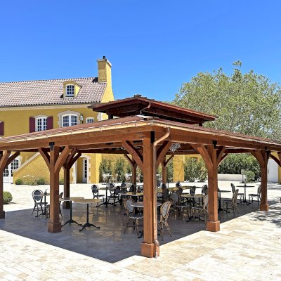 Custom Mia's Pavilion (Options: 35' x 25', Douglas-fir, Post Anchor Kit for High-Wind, 8x8 Posts, 8' H Posts, No Decorative Trims for Posts, with Ceiling Fan Bases, Custom Copper Roof and Gutters, Custom Finish). Photo Courtesy of Jordan Vineyard & Winery, 1474 Alexander Valley Rd, Healdsburg, CA.