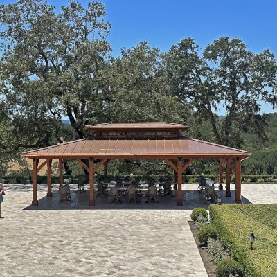 Custom Mia's Pavilion (Options: 35' x 25', Douglas-fir, Post Anchor Kit for High-Wind, 8x8 Posts, 8' H Posts, No Decorative Trims for Posts, with Ceiling Fan Bases, Custom Copper Roof and Gutters, Custom Finish). Photo Courtesy of Jordan Vineyard & Winery, 1474 Alexander Valley Rd, Healdsburg, CA.