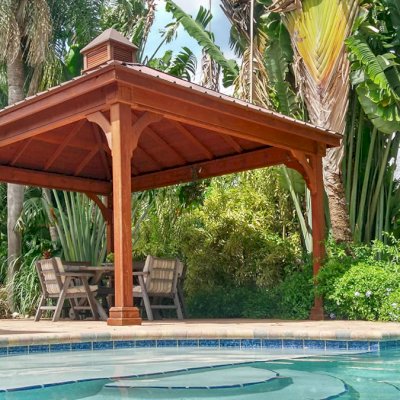 The Mia's Pavilion (Options: 20' L x 20' W, No Privacy Panels, California Redwood, 9.5' H, No Electrical Wiring Trim, 4-Post Anchor Kit for High-Wind, No Post Decorative Trim, No Ceiling Fan Base, No Curtain Rods, 10"x10" post thickness by Custom Request).