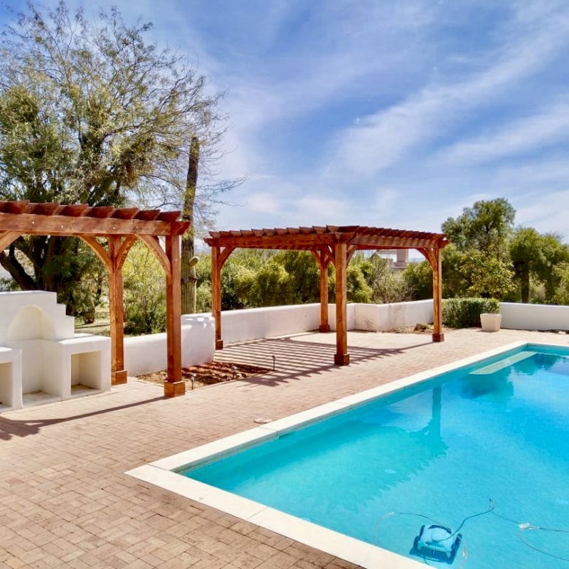 The Montvale Pergolas (Options: 14' x 8' & 20' x 16' & 4' x 6', Douglas-fir, Electrical Wiring Trim for 1 Post, Rafters at 16", Post Anchoring for Gale-Wind, No Ceiling Fan Base, No Privacy Panels, 10' Post, Transparent Premium Sealant). Photo courtesy of M. Simpson of Tucson, Arizona. The Montvale Pergolas (Options: 14' x 8' & 20' x 16' & 4' x 6', Douglas-fir, Electrical Wiring Trim for 1 Post, Rafters at 16", Post Anchoring for Gale-Wind, No Ceiling Fan Base, No Privacy Panels, 10' Post, Transparent Premium Sealant). Photo courtesy of M. Simpson of Tucson, Arizona.