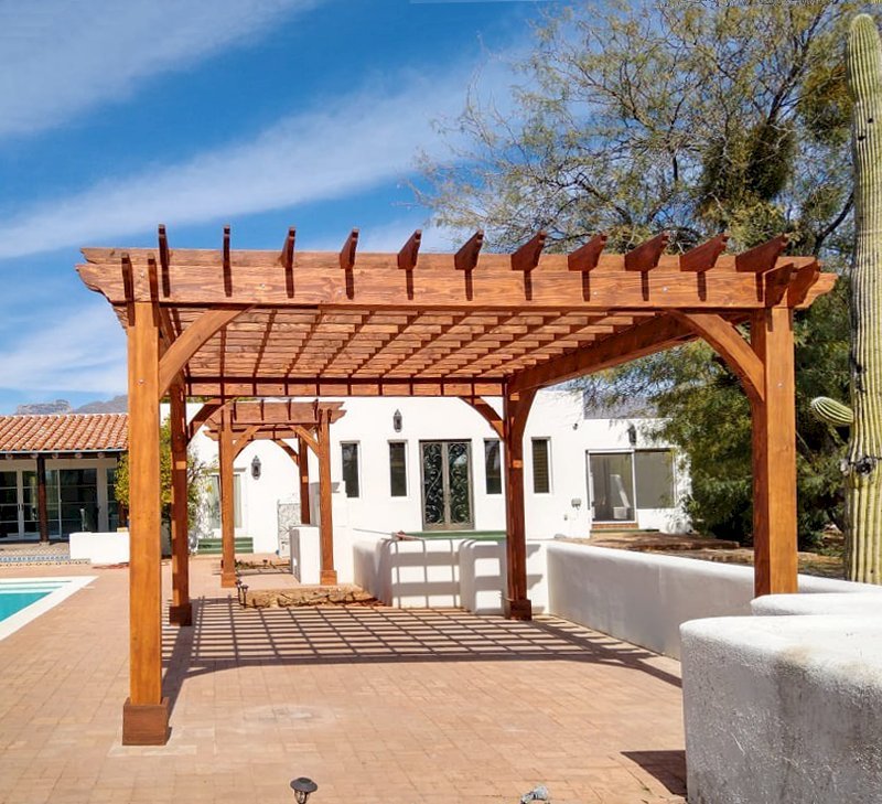 The Montvale Pergolas (Options: 14' x 8' & 20' x 16', Douglas-fir, Electrical Wiring Trim for 1 Post, Rafters at 16", Post Anchoring for Gale-Wind, No Ceiling Fan Base, No Privacy Panels, 10' Post, Transparent Premium Sealant). Photo courtesy of M. Simpson of Tucson, Arizona. The Montvale Pergolas (Options: 14' x 8' & 20' x 16', Douglas-fir, Electrical Wiring Trim for 1 Post, Rafters at 16", Post Anchoring for Gale-Wind, No Ceiling Fan Base, No Privacy Panels, 10' Post, Transparent Premium Sealant). Photo courtesy of M. Simpson of Tucson, Arizona.
