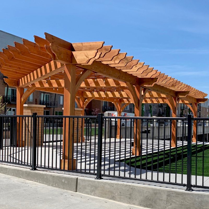 Custom The Montvale Pergola (Options: 42'-6" x 22'-6", Douglas-fir, Post Anchoring for Concrete, 2 x 12 Rafters and Supports and 8 x 8 Post, Transparent Premium Sealant). Photo Courtesy of H. Hillebrand of Louisville, Kentucky. Custom The Montvale Pergola (Options: 42'-6" x 22'-6", Douglas-fir, Post Anchoring for Concrete, 2 x 12 Rafters and Supports and 8 x 8 Post, Transparent Premium Sealant). Photo Courtesy of H. Hillebrand of Louisville, Kentucky.