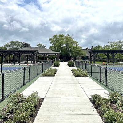 Custom Montvale Pergola (Options: 15' 7 1/2" W x 44' L, California Redwood, 12 x 12 Posts, 9' H, Post Anchor Kit for High-Wind, Custom Stain). Photo Courtesy of C/O Country Club of Detroit, Grosse Pointe Farms, MI.