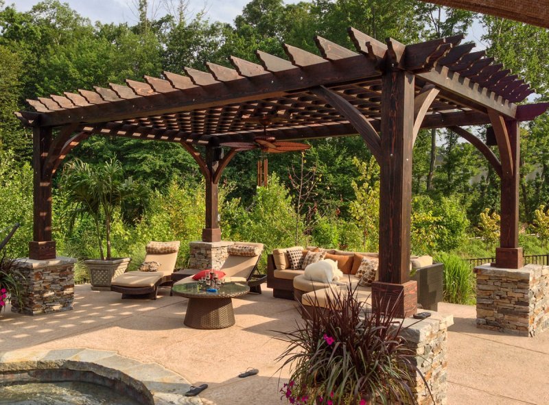 The Montvale Pergola (Options: 20' x 14', California Redwood, Electrical Wiring Trim for 1 Post, Rafters at 16", Post Anchoring for Stone, Brick or Concrete, Ceiling Fan Base, No Privacy Panels, 8.5' Post, Coffee-Stain Premium Sealant). Photo courtesy of William H. of Montvale, NJ. The Montvale Pergola (Options: 20' x 14', California Redwood, Electrical Wiring Trim for 1 Post, Rafters at 16", Post Anchoring for Stone, Brick or Concrete, Ceiling Fan Base, No Privacy Panels, 8.5' Post, Coffee-Stain Premium Sealant). Photo courtesy of William H. of Montvale, NJ.