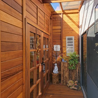 Palo Alto Backyard Cabin (Options: 18' L, 16' W, Without Porch, Structural Deck - Interior & 4' Exterior, California Redwood, Sugar Pine Internal Walls and Ceiling, Windows Purchased Locally, With Two 3' x 5' Skylights, Metal Roof, Custom Railings and Steps, Electrical Wire Trim on the Walls, Transparent Premium Sealant). Photo Courtesy of A. Ramon of South San Francisco, California.
