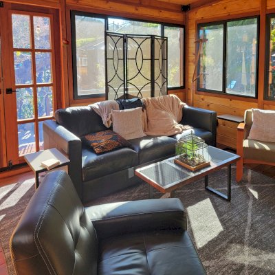 Palo Alto Backyard Cabin (Options: 18' L, 16' W, Without Porch, Structural Deck - Interior & 4' Exterior, California Redwood, Sugar Pine Internal Walls and Ceiling, Windows Purchased Locally, With Two 3' x 5' Skylights, Metal Roof, Custom Railings and Steps, Electrical Wire Trim on the Walls, Transparent Premium Sealant). Photo Courtesy of A. Ramon of South San Francisco, California.
