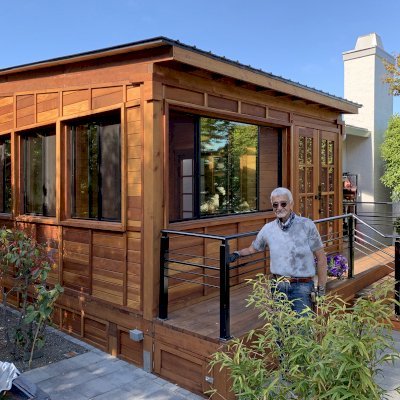 The Palo Alto Backyard Cabin (Options: 18' L, 16' W, Without Porch, Structural Deck - Interior & 4' Exterior, California Redwood, Sugar Pine Internal Walls and Ceiling, Windows Purchased Locally, With Two 3' x 5' Skylights, Metal Roof, Custom Railings and Steps, Electrical Wire Trim on the Walls, Transparent Premium Sealant). Photo Courtesy of A. Ramon of South San Francisco, California.