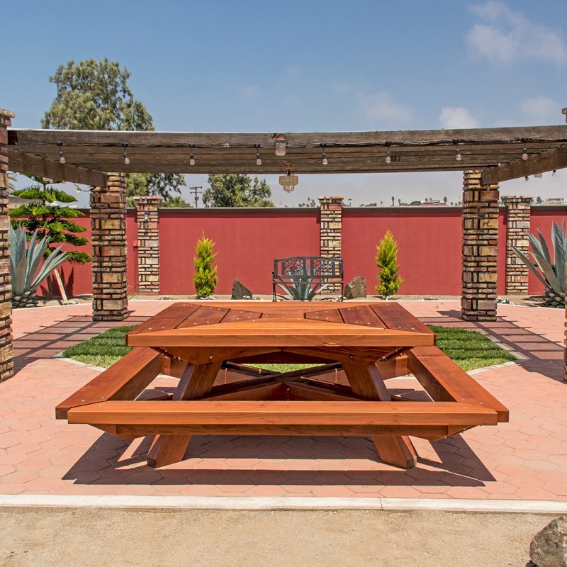 The Sea Ranch Picnic Table (options: 6ft x 6ft tabletop size, California Redwood, Slightly Rounded Corners (1/2-in radius), Transparent Premium Sealant). The Sea Ranch Picnic Table (options: 6ft x 6ft tabletop size, California Redwood, Slightly Rounded Corners (1/2-in radius), Transparent Premium Sealant).