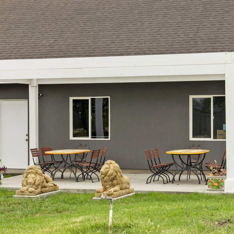 The Silverado Modern Pergola (Options: 20' L, 10' W, 12" Roof Rafter Spacing, Mosaic Eco-Wood, 4-Post Anchor kit for Concrete, White Primer). The Silverado Modern Pergola (Options: 20' L, 10' W, 12" Roof Rafter Spacing, Mosaic Eco-Wood, 4-Post Anchor kit for Concrete, White Primer).