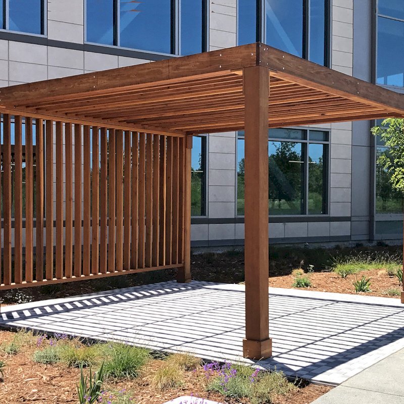 The Silverado Modern Pergola (Options: 16' L, 16' W, 8" Roof Rafter Spacing, California Redwood, 10.5' H Posts, 4-Post Anchor kit for Concrete, with 1 Custom Panel, Transparent Premium Sealant). Photo Courtesy of S. Barragan of Milpitas, California. The Silverado Modern Pergola (Options: 16' L, 16' W, 8" Roof Rafter Spacing, California Redwood, 10.5' H Posts, 4-Post Anchor kit for Concrete, with 1 Custom Panel, Transparent Premium Sealant). Photo Courtesy of S. Barragan of Milpitas, California.