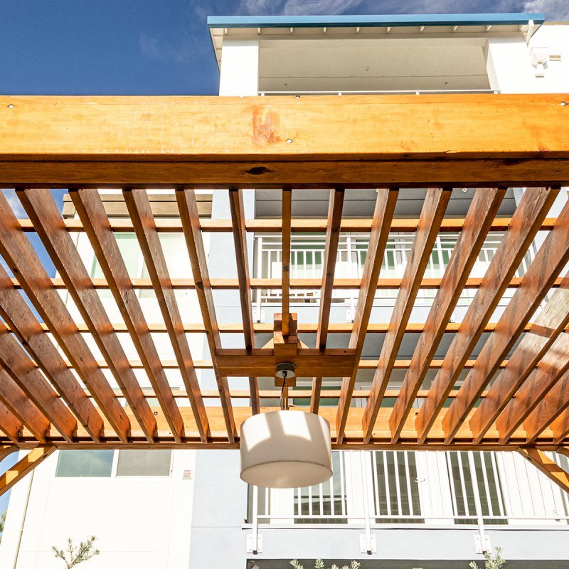 The Silverado Modern Pergola (Options: 20' L, 12' W, Douglas-fir, 1 Electrical Wiring Trim, 7 1/4" x 7 1/4" Posts, No Privacy Panels, No Curtain Rods, 1 Ceiling Fan Base, 10' Post Height, Transparent Premium Sealant). Photo Courtesy of J. Holtfreter of San Jose, California. The Silverado Modern Pergola (Options: 20' L, 12' W, Douglas-fir, 1 Electrical Wiring Trim, 7 1/4" x 7 1/4" Posts, No Privacy Panels, No Curtain Rods, 1 Ceiling Fan Base, 10' Post Height, Transparent Premium Sealant). Photo Courtesy of J. Holtfreter of San Jose, California.