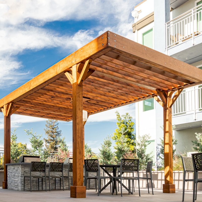 The Silverado Modern Pergola (Options: 20' L, 12' W, Douglas-fir, 1 Electrical Wiring Trim, 7 1/4" x 7 1/4" Posts, No Privacy Panels, No Curtain Rods, 1 Ceiling Fan Base, 10' Post Height, Transparent Premium Sealant). Photo Courtesy of J. Holtfreter of San Jose, California. The Silverado Modern Pergola (Options: 20' L, 12' W, Douglas-fir, 1 Electrical Wiring Trim, 7 1/4" x 7 1/4" Posts, No Privacy Panels, No Curtain Rods, 1 Ceiling Fan Base, 10' Post Height, Transparent Premium Sealant). Photo Courtesy of J. Holtfreter of San Jose, California.
