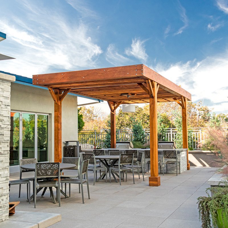 The Silverado Modern Pergola (Options: 20' L, 12' W, Douglas-fir, 1 Electrical Wiring Trim, 7 1/4" x 7 1/4" Posts, No Privacy Panels, No Curtain Rods, 1 Ceiling Fan Base, 10' Post Height, Transparent Premium Sealant). Photo Courtesy of J. Holtfreter of San Jose, California. The Silverado Modern Pergola (Options: 20' L, 12' W, Douglas-fir, 1 Electrical Wiring Trim, 7 1/4" x 7 1/4" Posts, No Privacy Panels, No Curtain Rods, 1 Ceiling Fan Base, 10' Post Height, Transparent Premium Sealant). Photo Courtesy of J. Holtfreter of San Jose, California.