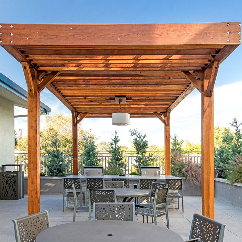 The Silverado Modern Pergola (Options: 20' L, 12' W, Douglas-fir, 1 Electrical Wiring Trim, 7 1/4" x 7 1/4" Posts, No Privacy Panels, No Curtain Rods, 1 Ceiling Fan Base, 10' Post Height, Transparent Premium Sealant). Photo Courtesy of J. Holtfreter of San Jose, California. The Silverado Modern Pergola (Options: 20' L, 12' W, Douglas-fir, 1 Electrical Wiring Trim, 7 1/4" x 7 1/4" Posts, No Privacy Panels, No Curtain Rods, 1 Ceiling Fan Base, 10' Post Height, Transparent Premium Sealant). Photo Courtesy of J. Holtfreter of San Jose, California.
