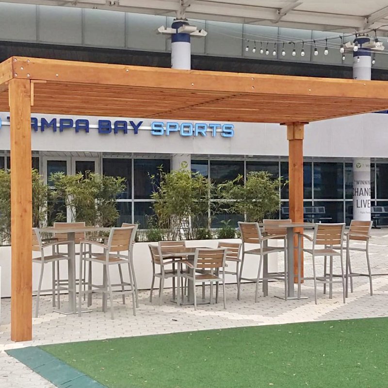 The Silverado Modern Pergola (options: 20' L, 20' W, Douglas-fir, No Electrical Wiring Trim, 7 1/4" x 7 1/4" Posts, No Privacy Panels, No Curtain Rods, 9.5' Post Height, Transparent Premium Sealant). Photo Courtesy of The Tampa Bay Lightning NHL Team. The Silverado Modern Pergola (options: 20' L, 20' W, Douglas-fir, No Electrical Wiring Trim, 7 1/4" x 7 1/4" Posts, No Privacy Panels, No Curtain Rods, 9.5' Post Height, Transparent Premium Sealant). Photo Courtesy of The Tampa Bay Lightning NHL Team.