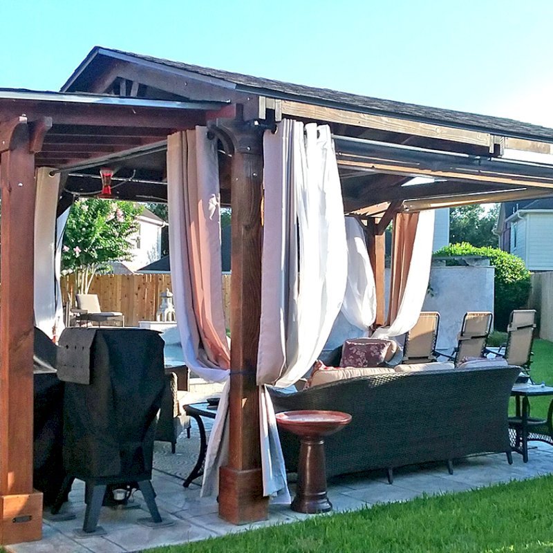 The Sunset Patio Pavilion Attached to a Del Norte Pavilion (Options: 10' x 5', Douglas-fir, No Ceiling Fan Base, No Electrical Wiring Trim Kit, 2-Post Anchor Kit for Concrete, Transparent Premium Sealant). Photo Courtesy of Jennifer Grizzle of Katy, Texas. The Sunset Patio Pavilion Attached to a Del Norte Pavilion (Options: 10' x 5', Douglas-fir, No Ceiling Fan Base, No Electrical Wiring Trim Kit, 2-Post Anchor Kit for Concrete, Transparent Premium Sealant). Photo Courtesy of Jennifer Grizzle of Katy, Texas.