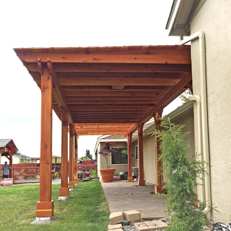 The Sunset Patio Pavilion (Options: 24' x 12', California Redwood, One Ceiling Fan Base, Electrical Wiring Trim Kit for 1 Post, Gale-Wind Anchors for 8 Posts, 8 x 8 Posts by Custom Request, Transparent Premium Sealant) with a 12' x 14' Garden Pergola Attached. Photo Courtesy of G. Scotzin of Pasco, WA. The Sunset Patio Pavilion (Options: 24' x 12', California Redwood, One Ceiling Fan Base, Electrical Wiring Trim Kit for 1 Post, Gale-Wind Anchors for 8 Posts, 8 x 8 Posts by Custom Request, Transparent Premium Sealant) with a 12' x 14' Garden Pergola Attached. Photo Courtesy of G. Scotzin of Pasco, WA.