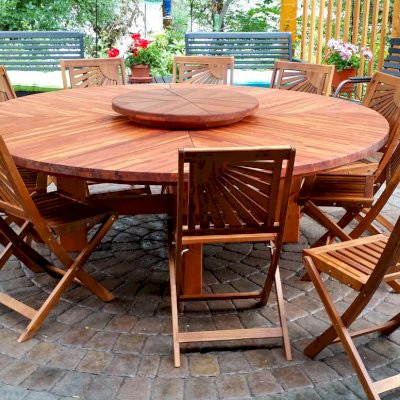 Sunset Patio Table (Options:7' Diameter, Table Alone, Mosaic Redwood, Standard Tabletop, Lazy Susan, No Umbrella Hole, Transparent Premium Sealant). Lazy Susan in Old-Growth Wood by Custom Request. Chairs not from Forever Redwood. Photo Courtesy of John Farkas of Vida, Oregon.