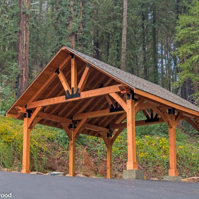 The Thick Timber Toledo Wood Pavilions  (Options: 27' L x 25' W, Douglas-fir, 6-Post Anchor Kit for High-Wind, No Electrical Wiring Trims, 10 x 10 Supports and Posts, 8 x 8 Rafters [8 x 12 Bottom Chord], No Fan Base, Transparent Premium Sealant). Photo Courtesy of M. Prosise of Napa, California.
