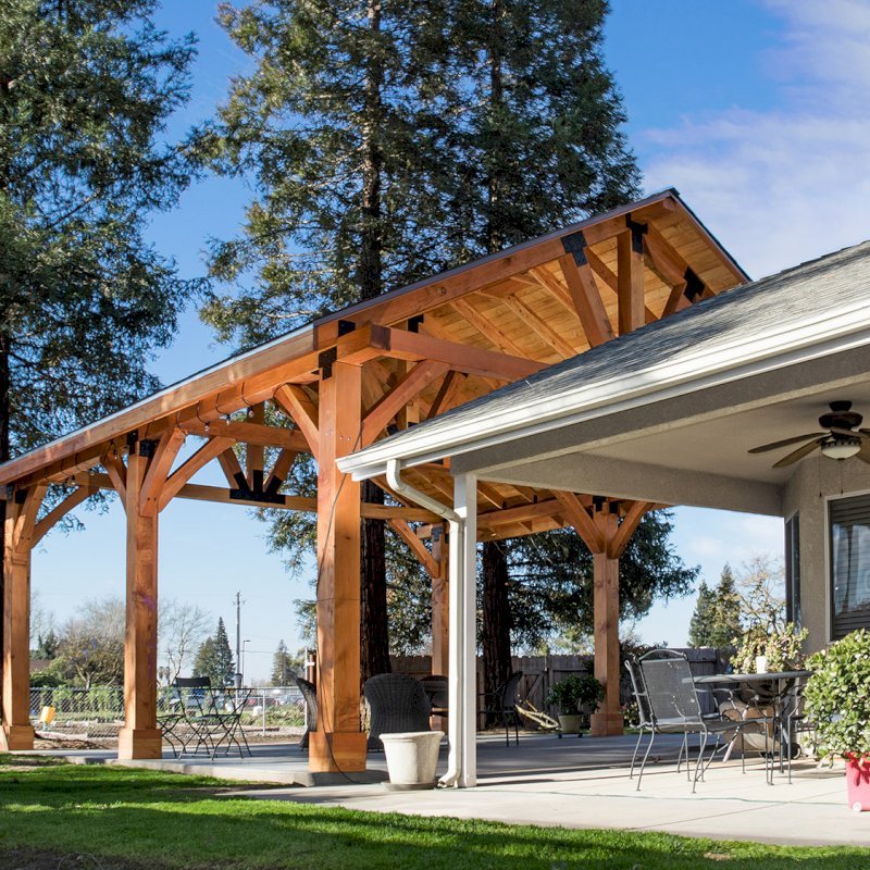 The Thick Timber Toledo Wood Pavilions (Options: 27' L x 25' W, Douglas-fir, 6-Post Anchor Kit for Gale-Wind, Electrical Wiring Trim for 2 Posts, 8 x 8 Supports and Posts, 8 x 8 Rafters, 2 Fan Bases, Transparent Premium Sealant). Photo Courtesy of T. Lane of Kingsburg, CA. The Thick Timber Toledo Wood Pavilions (Options: 27' L x 25' W, Douglas-fir, 6-Post Anchor Kit for Gale-Wind, Electrical Wiring Trim for 2 Posts, 8 x 8 Supports and Posts, 8 x 8 Rafters, 2 Fan Bases, Transparent Premium Sealant). Photo Courtesy of T. Lane of Kingsburg, CA.