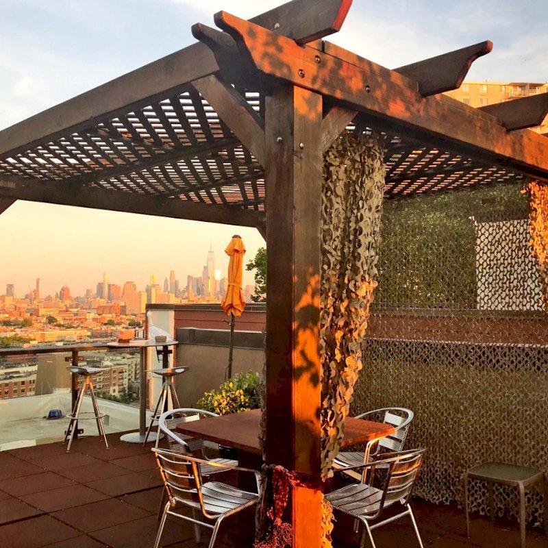 Add some fabric for a special touch. Garden Pergola (Options: 10' x 10', Mature Redwood, No Electrical Wiring Trim, Lattice Roof, 4-Post Anchor Kit for Stone, No Ceiling Fan Base, No Privacy Panels, No Curtain Rods, 9' Post Height, Transparent Premium Sealant). Photo Courtesy of Fabienne Jacquet of Union City, New Jersey. Add some fabric for a special touch. Garden Pergola (Options: 10' x 10', Mature Redwood, No Electrical Wiring Trim, Lattice Roof, 4-Post Anchor Kit for Stone, No Ceiling Fan Base, No Privacy Panels, No Curtain Rods, 9' Post Height, Transparent Premium Sealant). Photo Courtesy of Fabienne Jacquet of Union City, New Jersey.