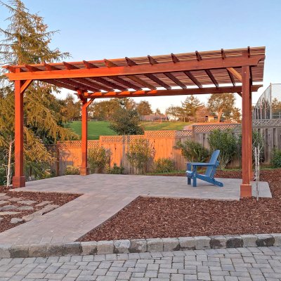 The Traditional Wooden Garden Pergola (Options: 20' L x 14' W, California Redwood, No Electrical Wiring Trims, Open Roof with Slats at 6", Rafters at 18", Standard End Cut Detail, 4-Post Anchor Kit for Concrete, No Post Decorative Trims, No Ceiling Fan Base, No Privacy Panels, No Curtain Rods, 9.5' Posts, Transparent Premium Sealant). Photo Courtesy of J. Meyer of Los Gatos, CA.