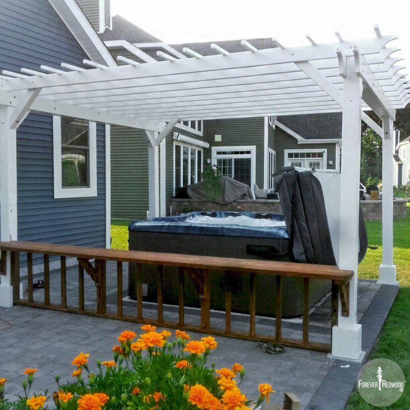The Traditional Wooden Garden Pergola (Options: 16' L x 14' W, Douglas-fir, No Electrical Wiring Trim, Open Roof with Slats at 12", Rafters at 18", 4-Post Anchor Kit for Concrete, No Ceiling Fan Base, No Privacy Panels, No Curtain Rods, 9' Post Height, Off-White Oil-Based Primer). Photo Courtesy of V. Yzaguirre of Lewes, Delaware. The Traditional Wooden Garden Pergola (Options: 16' L x 14' W, Douglas-fir, No Electrical Wiring Trim, Open Roof with Slats at 12", Rafters at 18", 4-Post Anchor Kit for Concrete, No Ceiling Fan Base, No Privacy Panels, No Curtain Rods, 9' Post Height, Off-White Oil-Based Primer). Photo Courtesy of V. Yzaguirre of Lewes, Delaware.