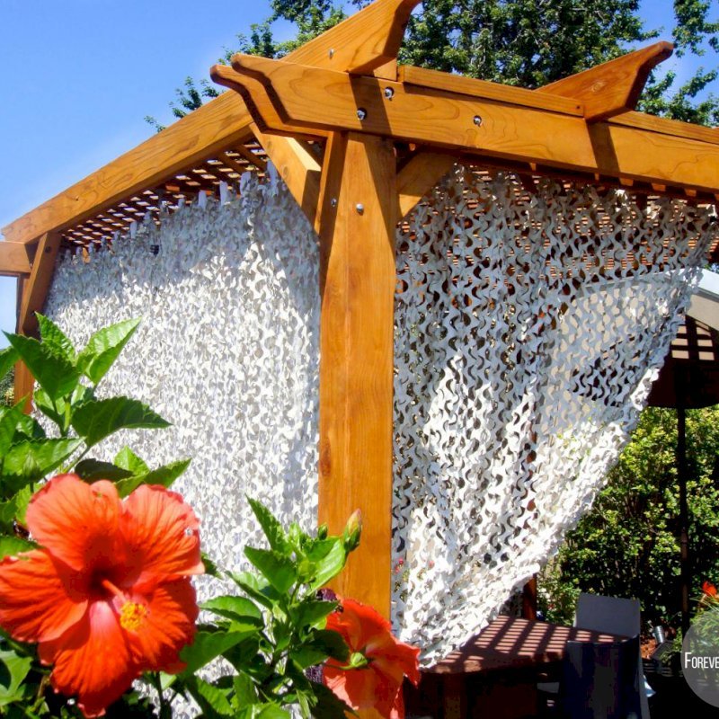 Add some fabric for a special touch. Garden Pergola (Options: 10' x 10', Mature Redwood, No Electrical Wiring Trim, Lattice Roof, 4-Post Anchor Kit for Stone, No Ceiling Fan Base, No Privacy Panels, No Curtain Rods, 9' Post Height, Transparent Premium Sealant). Add some fabric for a special touch. Garden Pergola (Options: 10' x 10', Mature Redwood, No Electrical Wiring Trim, Lattice Roof, 4-Post Anchor Kit for Stone, No Ceiling Fan Base, No Privacy Panels, No Curtain Rods, 9' Post Height, Transparent Premium Sealant).