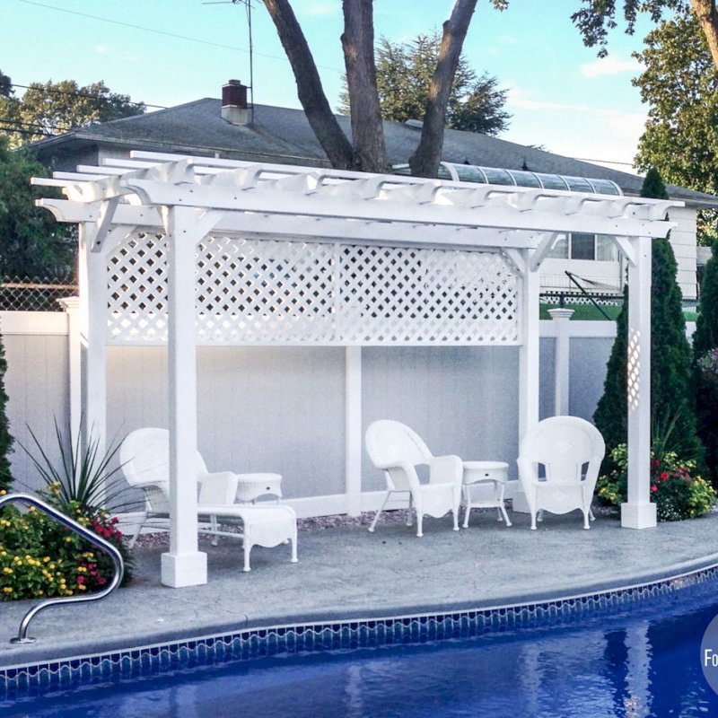 The Traditional Wooden Garden Pergola (Options: 16' L x 8' W, Douglas-fir, No Electrical Wiring Trim, Open Roof with Slats at 12", Rafters at 18", Lengthwise Roof Support Timbers, 4-Post Anchor Kit for Stone, No Ceiling Fan Base, 1 Privacy Panel, No Curtain Rods, 9' Post Height, Off-White Oil-Based Primer). Photo Courtesy of Leo and Genevieve Kirchner of South Amboy, New Jersey. The Traditional Wooden Garden Pergola (Options: 16' L x 8' W, Douglas-fir, No Electrical Wiring Trim, Open Roof with Slats at 12", Rafters at 18", Lengthwise Roof Support Timbers, 4-Post Anchor Kit for Stone, No Ceiling Fan Base, 1 Privacy Panel, No Curtain Rods, 9' Post Height, Off-White Oil-Based Primer). Photo Courtesy of Leo and Genevieve Kirchner of South Amboy, New Jersey.
