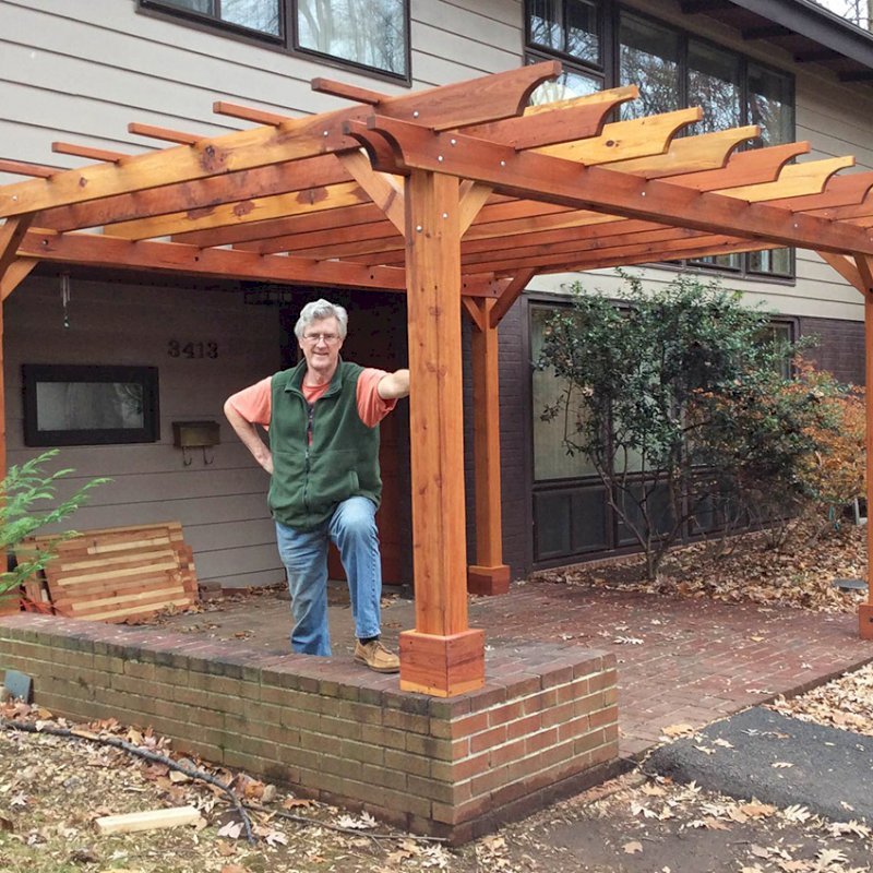 The Traditional Wooden Garden Pergola (Options: 11' 4" x 16', California Redwood, Slats at 36", Custom Posts Length, 4-post kit for stone, brick, or concrete, Transparent Premium Sealant). Photo Courtesy of Jhon & Janet K. of Falls Church, Virginia. The Traditional Wooden Garden Pergola (Options: 11' 4" x 16', California Redwood, Slats at 36", Custom Posts Length, 4-post kit for stone, brick, or concrete, Transparent Premium Sealant). Photo Courtesy of Jhon & Janet K. of Falls Church, Virginia.