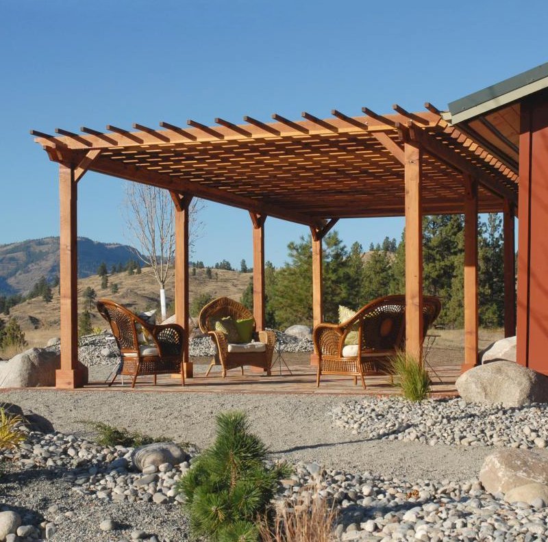The Traditional Wooden Garden Pergola (Options: 30' L x 16' W, Mature Redwood, No Electrica Wiring Trim Kit, Slats at 12" and Rafters at 18", Lengthwise Roof Support Timbers, 6-Post Anchor Kit for Concrete, No Ceiling Fan Base, No Privacy Panels, No Curtain Rods, 9' Post Height, Transparent Premium Sealant, Custom: 2 extra post). Photo Courtesy of Mr. Craig Lawrence of Renton, WA. The Traditional Wooden Garden Pergola (Options: 30' L x 16' W, Mature Redwood, No Electrica Wiring Trim Kit, Slats at 12" and Rafters at 18", Lengthwise Roof Support Timbers, 6-Post Anchor Kit for Concrete, No Ceiling Fan Base, No Privacy Panels, No Curtain Rods, 9' Post Height, Transparent Premium Sealant, Custom: 2 extra post). Photo Courtesy of Mr. Craig Lawrence of Renton, WA.