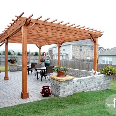 The Traditional Wooden Garden Pergola (Options: 25' L x 16' W, Mature Redwood, No Electrical Wiring Trim, Slats at 12" and Rafters at 18", Lengthwise Roof Support Timbers, 6-Post Anchor Kit For Stone, No Ceiling Fan Base, No Privacy Panels, No Curtain Rods, 9' Post Height, Transparent Premium Sealant).