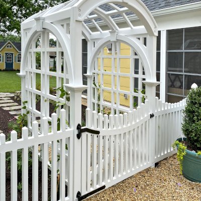 Custom Victorian Trellis (Options: 5' W x 5' D, Douglas-fir, 8' H, 4x4's Posts, Post Anchor Kit for Concrete, Custom Stain) with Custom Fence and Door. Photo Courtesy of Jessica and Brian Steel of Leesburg, Maryland.