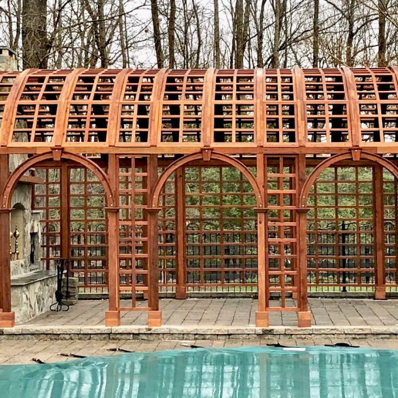 The Victorian Trellis (Options: 22' L x 14' W, Combination of Arcs and Lattice Panels, Mature Redwood, No Rain Guard, 9' Post Height, No Electrical Wiring Trim, 4-Post Anchor Kit for Stone, No Ceiling Fan Base, Transparent Premium Sealant). The Victorian Trellis (Options: 22' L x 14' W, Combination of Arcs and Lattice Panels, Mature Redwood, No Rain Guard, 9' Post Height, No Electrical Wiring Trim, 4-Post Anchor Kit for Stone, No Ceiling Fan Base, Transparent Premium Sealant).