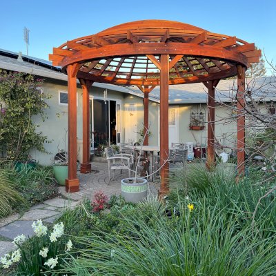 The Wooden Dome Pergola (Options: 16' Diameter, Without Deck, California Redwood, Open Roof with Slats at 6", 9' Posts, No Electrical Wiring Trim, 6-Post Anchor Kit for Concrete, Transparent Premium Sealant).