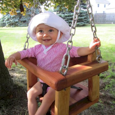 Toddler Swing Seats (Options: Mature Redwood, All Tree Hanging Hardware, Transparent Premium Sealant). Photo Courtesy of Jenny & Justin C. Lambertville, MI.