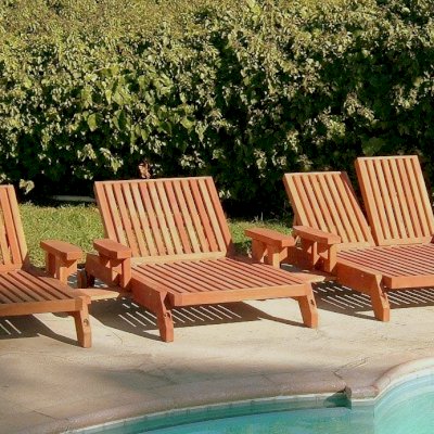 Tony's Wooden Deck Lounger (Options: L to R: Single, Honeymoon and Double, Standard 74", Mature Redwood, Single has Snack Tray on Right Side, Honeymoon and Double have Snack Trays on Both Sides, 13" H, Wheels, No Cushion, Transparent Premium Sealant)