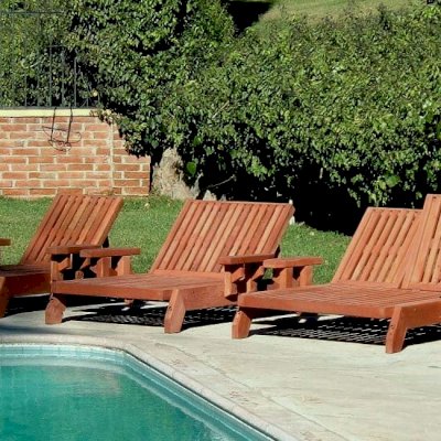 Tony's Wooden Deck Lounger (Options: L to R: Single, Honeymoon and Double, Standard 74", Mature Redwood, Single has Snack Tray on Right Side, Honeymoon and Double have Snack Trays on Both Sides, 13" H, Wheels, No Cushion, Transparent Premium Sealant)