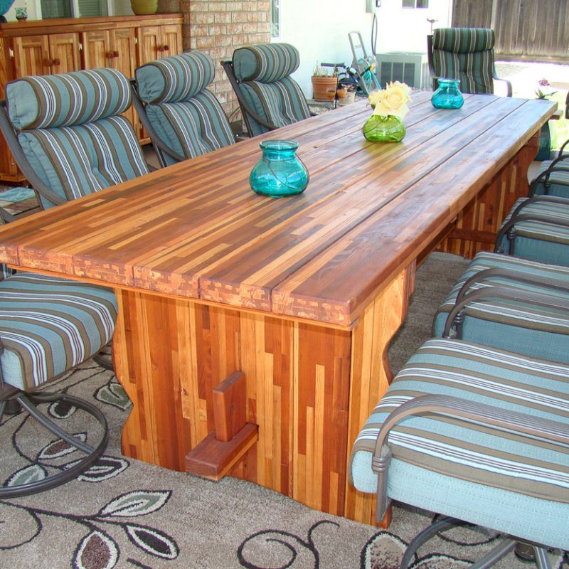 Trestle Natural Wood Outdoor Table (Options: 10' L, 28 3/4" W Tabletop, No Seating, Mosaic Eco-Wood, Standard Tabletop, Squared Corners, No Umbrella Hole, Transparent Premium Sealant). Photo Shows Kiyomi's Host Cart in Background. Photo Courtesy of Robbi & Mike of Concorde, CA. Trestle Natural Wood Outdoor Table (Options: 10' L, 28 3/4" W Tabletop, No Seating, Mosaic Eco-Wood, Standard Tabletop, Squared Corners, No Umbrella Hole, Transparent Premium Sealant). Photo Shows Kiyomi's Host Cart in Background. Photo Courtesy of Robbi & Mike of Concorde, CA.